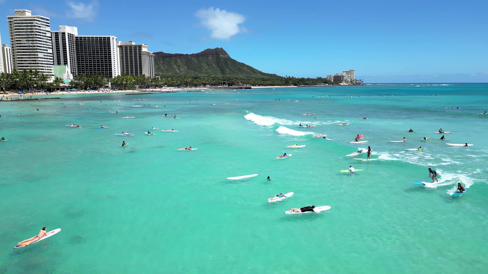 Surfers at Waikiki, from my DJI mini 3 pro, 2023-05-31-12h42m29s605