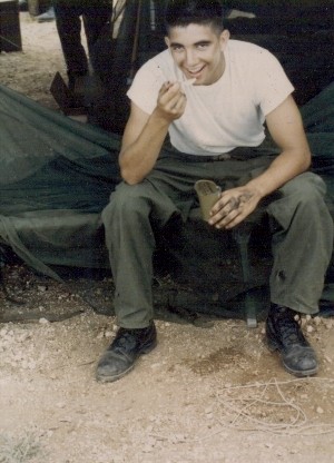 On the Island of Ie Shima, eating C-Rations (Ernie Pyle died by sniper fire on the island, 18 April 1945)